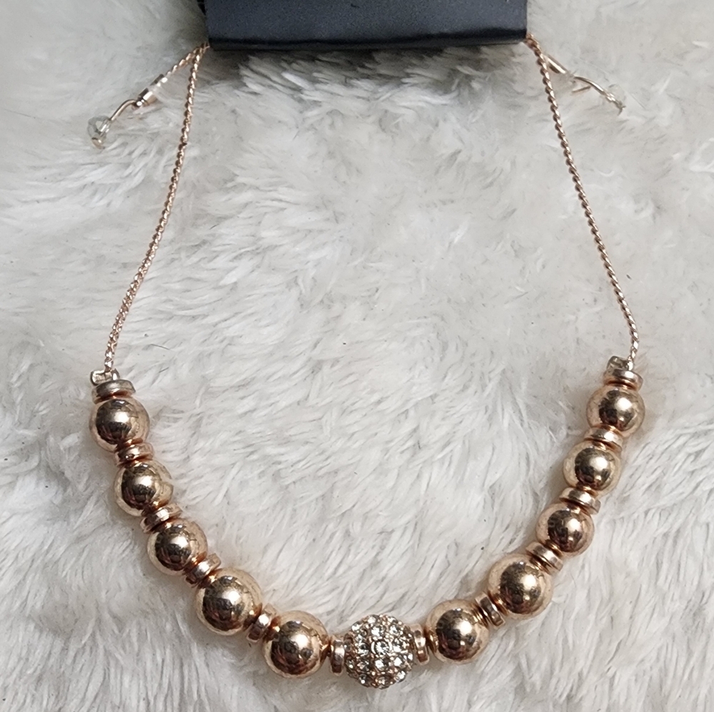 NEW Rose Gold & Crystal beaded bracelet. Fully adjustable w/sliding ball closure
